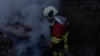 Ukraine -- Rescue workers at the site of Russian strike, Kyiv, 7Apr2025